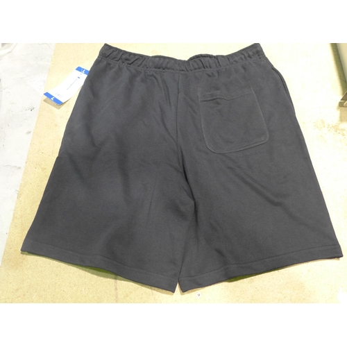 3328 - Bag of men's black Champion shorts, all size large, approx.. 8 pairs * this lot is subject to VAT