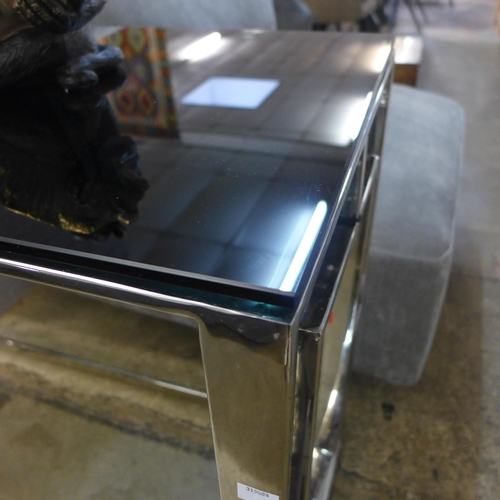 1399 - A chrome and black glass top console table