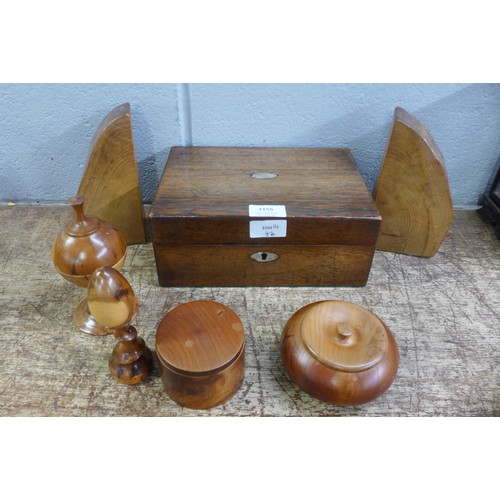 1155 - A workbox, a pair of wooden bookends and a collection of treen