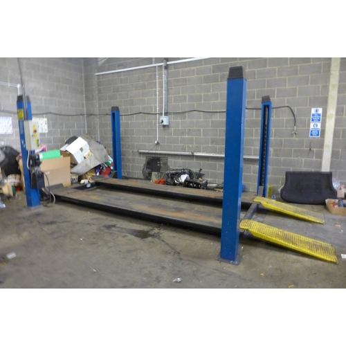 2999 - Straightset Engineering Services three tonne four post automotive lift, manufactured 1999, serial 11... 