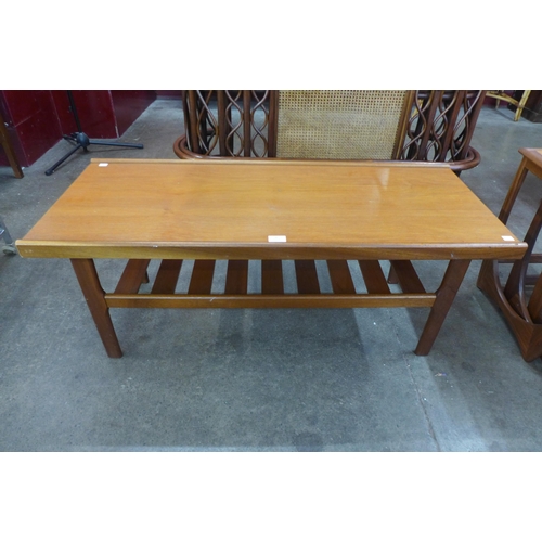 47 - A teak coffee table