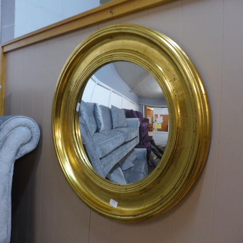 1322 - A large gold convex mirror, 74cms (M11555)   #