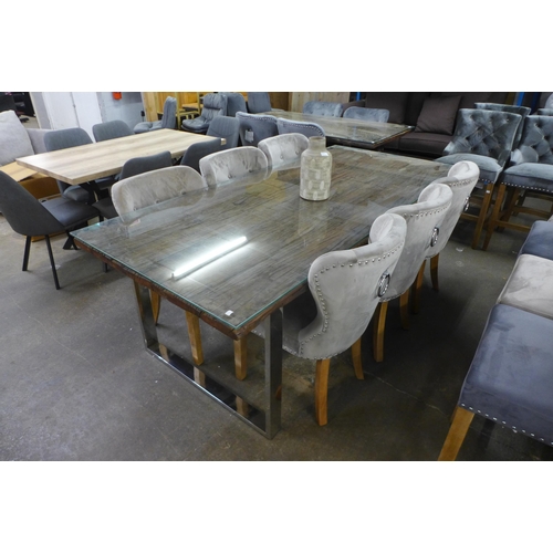 1326 - A Chennai 220cm glass top dining table with a set of six Arlo taupe velvet button back and studded d... 