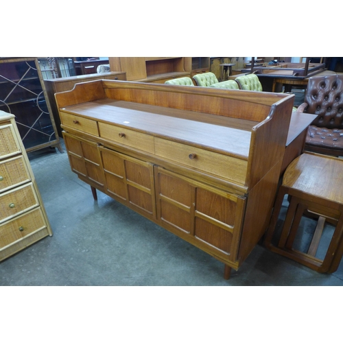 76 - A Nathan teak highboard