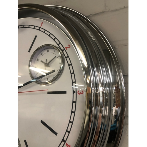 1390 - A chrome multi dial clock