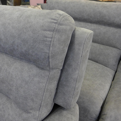 1392 - A Merlin grey oversized armchair