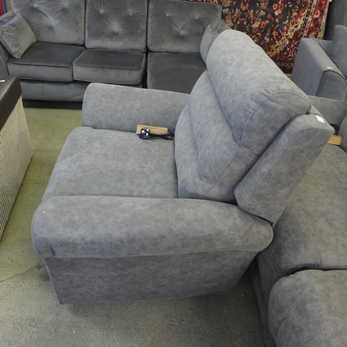 1392 - A Merlin grey oversized armchair