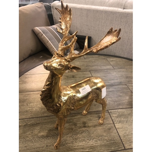 1420 - A gold stag, H 40cms. Slight damage to antler  (767712)   #