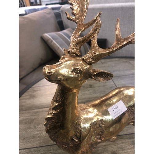 1420 - A gold stag, H 40cms. Slight damage to antler  (767712)   #