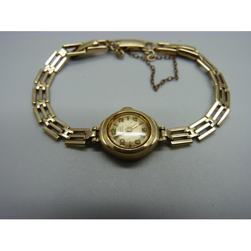 1001 - A lady's 9ct gold wristwatch, gross weight 12.3g