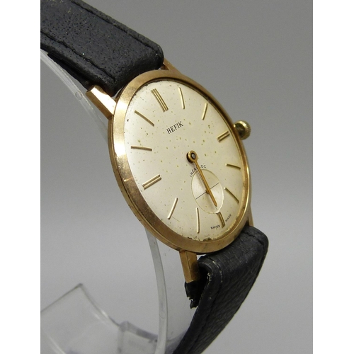 1007 - A Hefik 9ct gold dress wristwatch in Hefik box, glass and crown loose, one hand missing