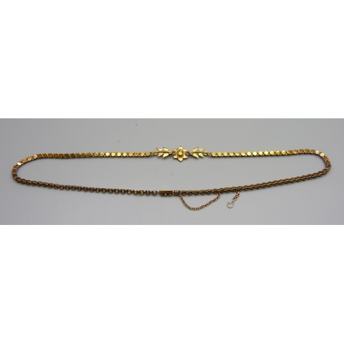 1008 - An antique yellow metal and seed pearl necklace in a fitted case, 13.9g