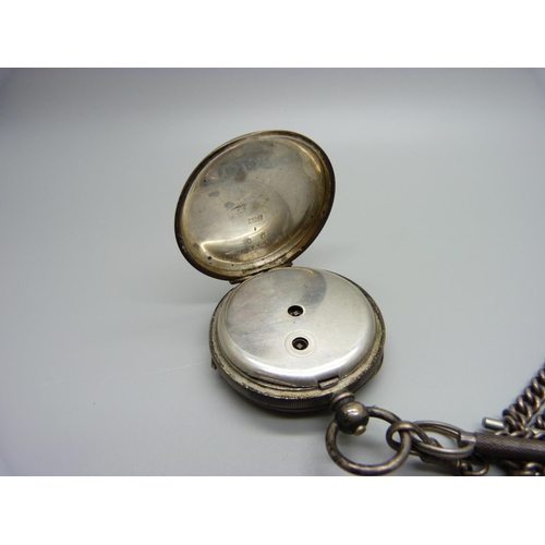 1018 - A silver lever pocket watch, a silver Albert chain and fob