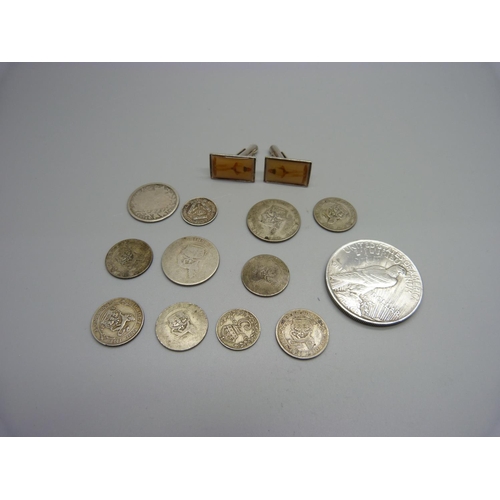 1024 - A 1922 American silver dollar, silver coins and cufflinks, 69g