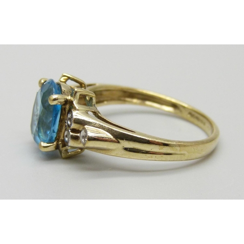 1029 - A 9ct gold, topaz and diamond ring, 2.7g, N