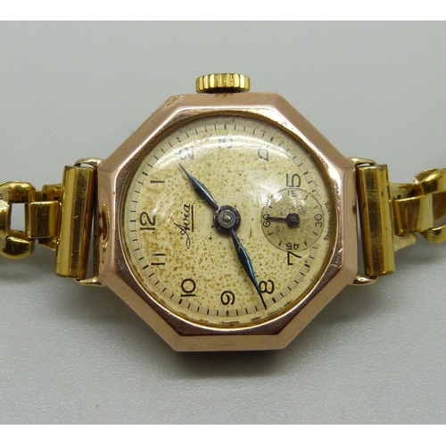 1036 - A lady's 9ct gold cased Avia wristwatch with plated strap