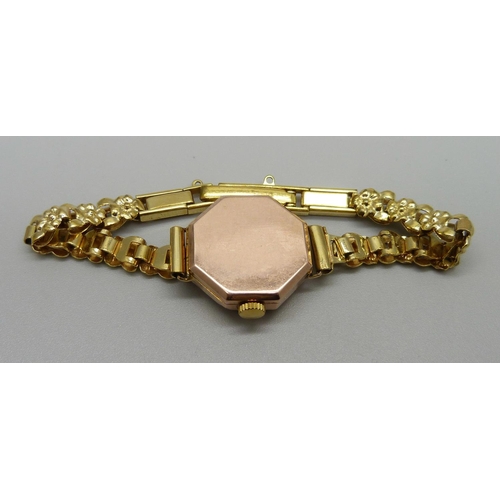 1036 - A lady's 9ct gold cased Avia wristwatch with plated strap