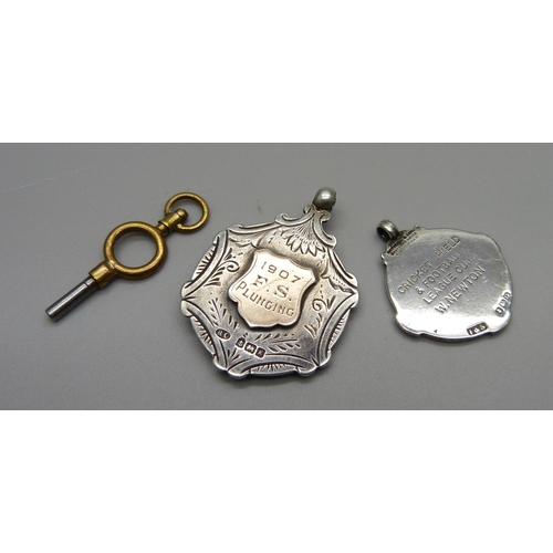 1037 - Two silver and enamel sporting fobs, etc.