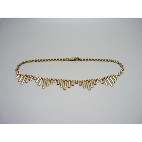 1044 - A 9ct gold fringe necklace, stamped 375, 18.9g