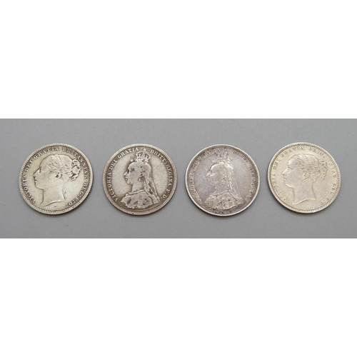 1055 - Four one shilling coins, 1885, 1886, 1887 and 1888