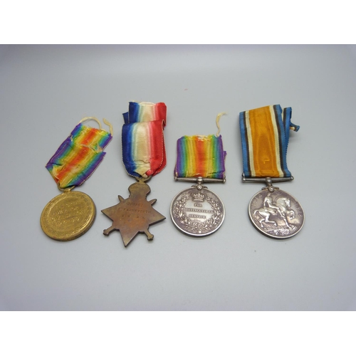 1060 - Four WWI medals, a Distinguished Service Medal, a 1915/15 Star, General Service Medal and British Vi... 