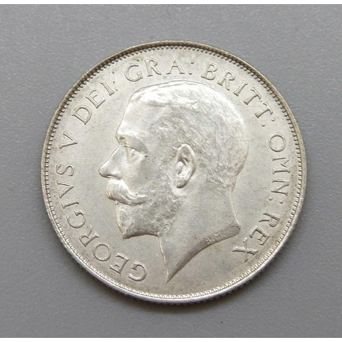 1062 - A George V 1924 shilling, uncirculated