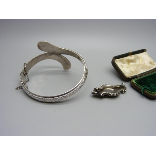 1090 - A Victorian silver 'Mother' brooch and a Siam silver snake bangle, 23g