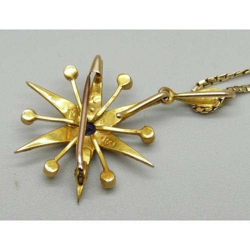 1118 - A Victorian 15ct gold star pendant and 9ct gold chain, set with a sapphire and seed pearls, 6.9g