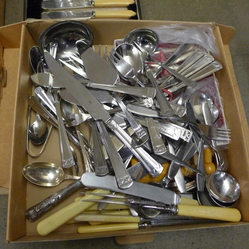 1167 - Two boxes of plated and stainless steel cutlery **PLEASE NOTE THIS LOT IS NOT ELIGIBLE FOR POSTING A... 