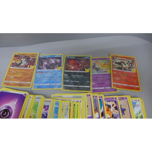 621 - Pokemon cards; a Pokemon collectors tin containing 150 basic Pokemon cards and five holographic card... 