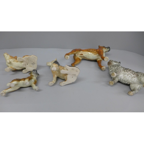 627 - Five West German dog figures