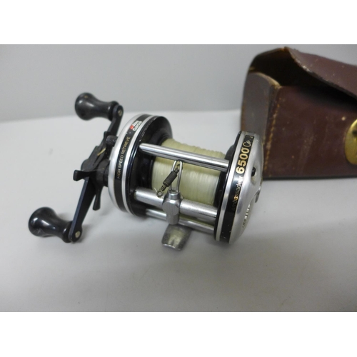 644 - Two fishing reels; Ambassadeur and Garcia Mitchell 710, Ambassadeur with leather case, a/f