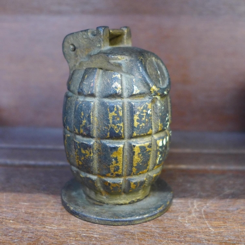 650 - A novelty money bank fashioned from a deactivated WWI hand grenade