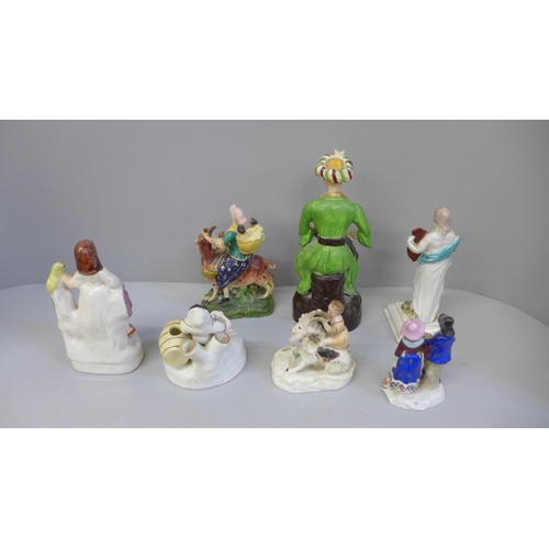 688 - A collection of Staffordshire figures and continental figures (8)