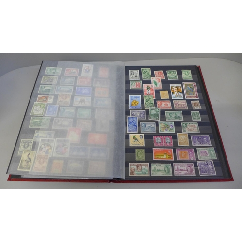 692 - An album of over 500 mint hinged and unhinged stamps, 1930's onwards