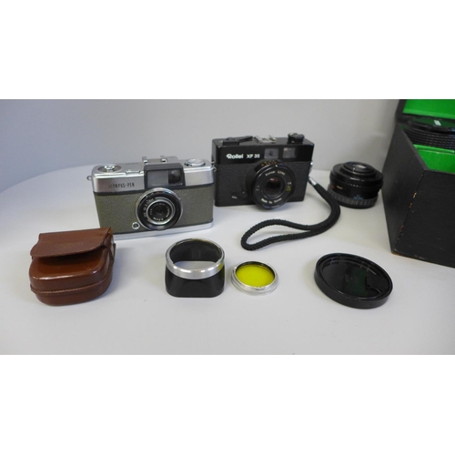 694 - A Zenit 12 x 8 film camera, lens, additional lens and flash, a Rollei XF35 camera and an Olympus-Pen... 