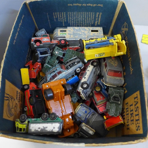 719 - A collection of Dinky, Matchbox and other die-cast model vehicles