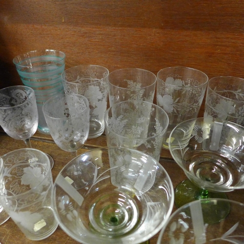 727 - A small collection of etched and cut glass drinking glasses and custard cups