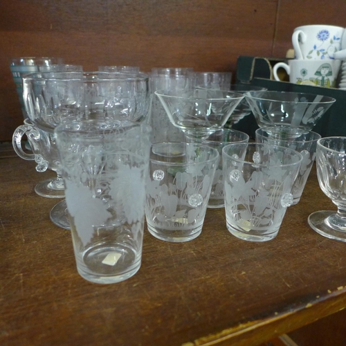 727 - A small collection of etched and cut glass drinking glasses and custard cups