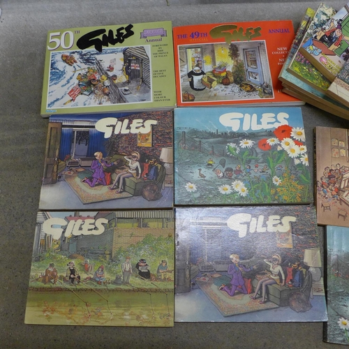 761 - A collection of fourteen Giles cartoon books from 1960's onwards, including commemorative 49th and 5... 