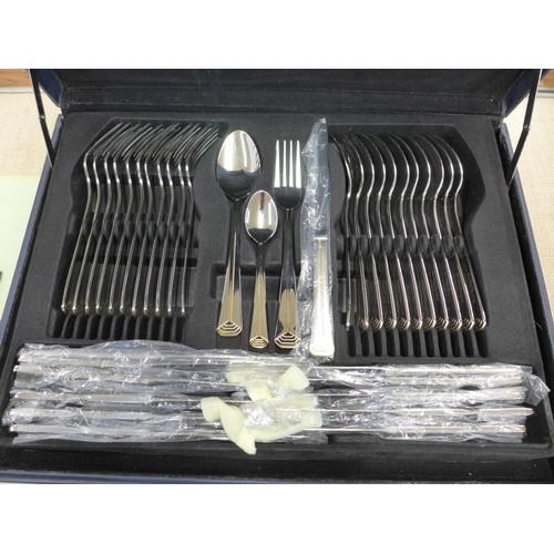 765 - A canteen of Solingen cutlery