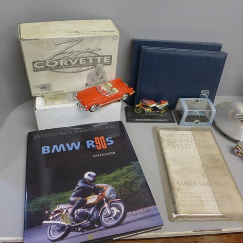 791 - A collection of motoring related items including a Cadillac and Rolls-Royce owners manual