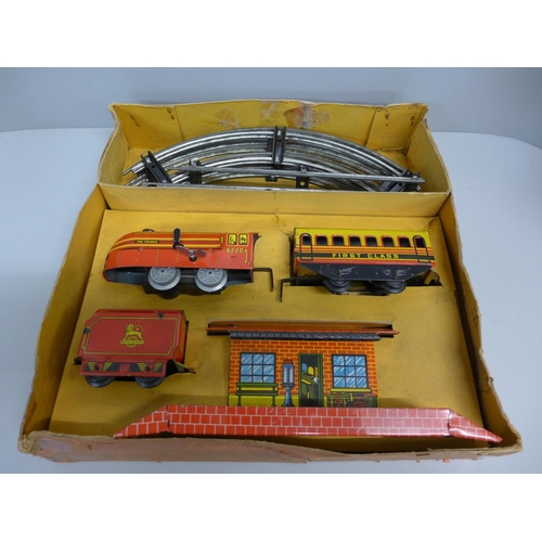 793 - A Brimtoy tin plate train set, boxed