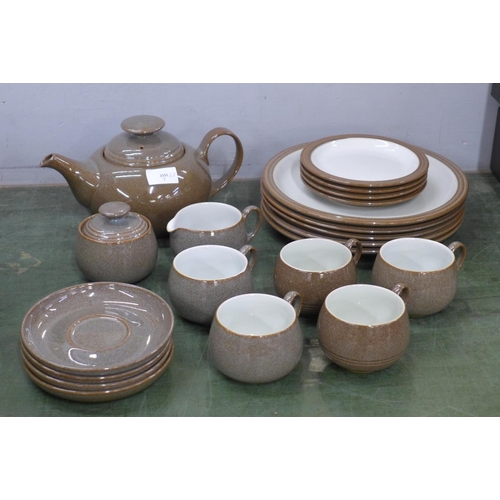 803 - A Denby tea set including a teapot, milk jug, sugar bowl, five cups, four saucers, four side plates ... 