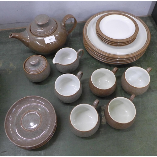 803 - A Denby tea set including a teapot, milk jug, sugar bowl, five cups, four saucers, four side plates ... 