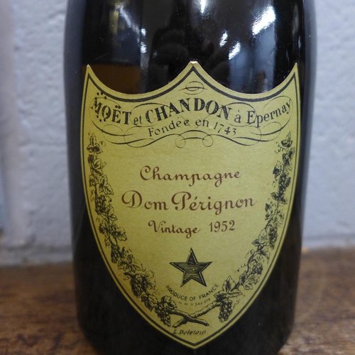 828 - A bottle of Moet and Chandon Dom Perignon Champagne, 1952 vintage