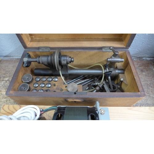 832 - A Lorch watchmaker's lathe with twelve collets, accessories and drive motor, boxed