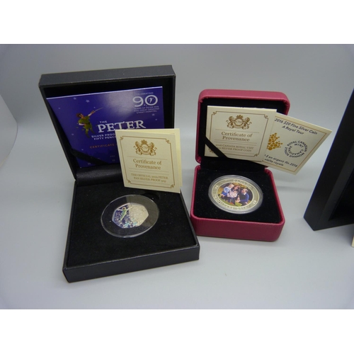 861 - Three silver coins, A Royal Tour $20 coin, a 75th VE Day Anniversary coin and a Peter Pan silver 50p... 