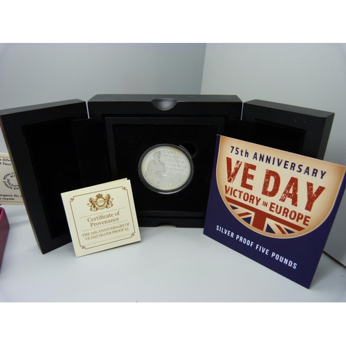 861 - Three silver coins, A Royal Tour $20 coin, a 75th VE Day Anniversary coin and a Peter Pan silver 50p... 