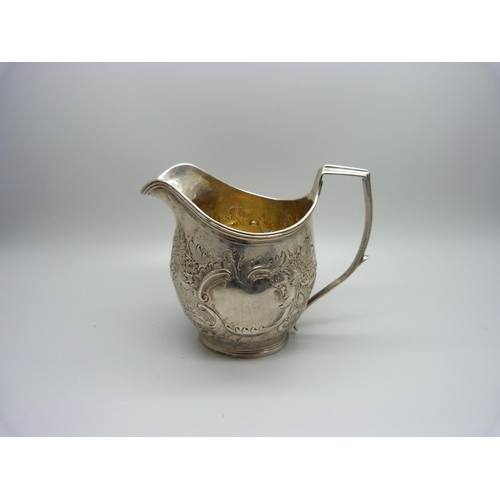 865 - A Georgian silver jug, hallmarks worn, 111g